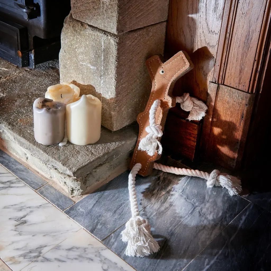 Stick man by fireplace new.webp