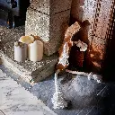 Stick man by fireplace new.webp