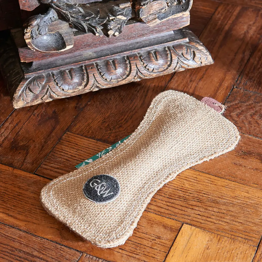 Funny Bone by table leg.webp